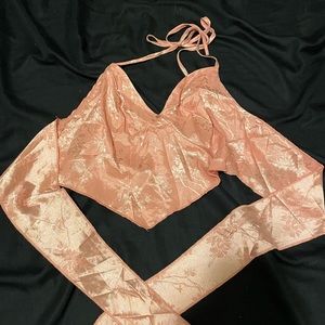 size s pink satin with designs halter and tie behind